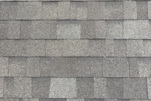 Recently repaired roof with upgraded architectural shingles, also known as laminated shingles.